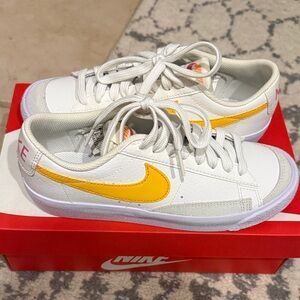 Nike Blazer low 77 White Sneakers with Yellow Swoosh 4.5 kids or 6.5 women’s